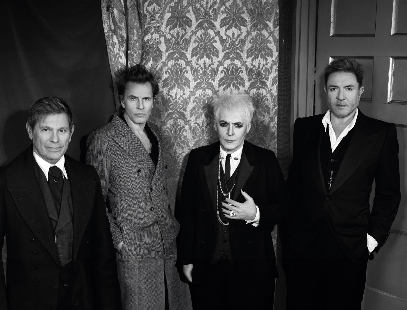 Photo of Duran Duran four members from the set of BLACK MOONLIGHT video